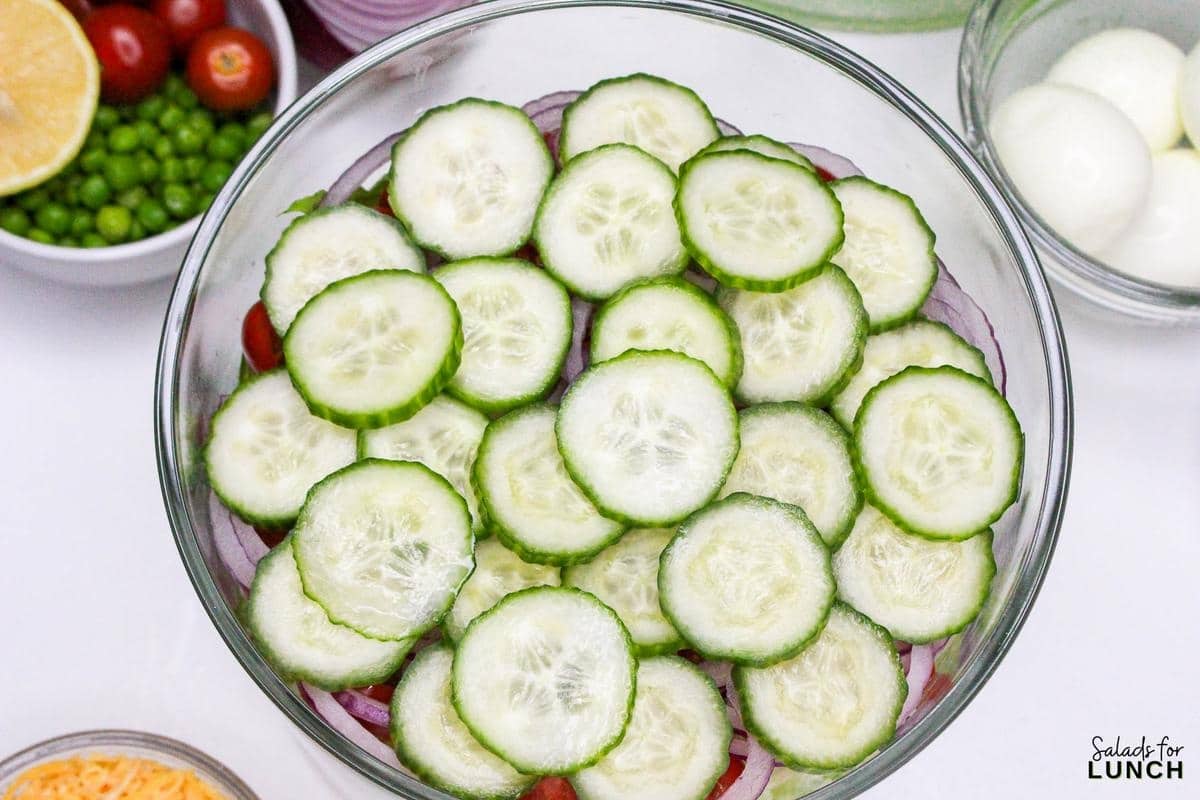 7 Layer Salad Recipe 13 - This Classic 7 Layer Salad is a tasty, healthy and fun make ahead salad for gatherings. It brings a burst of flavor and color to your table, making it a perfect choice for any relaxed get-together or potluck. Enjoy creating and sharing this delightful layered salad!