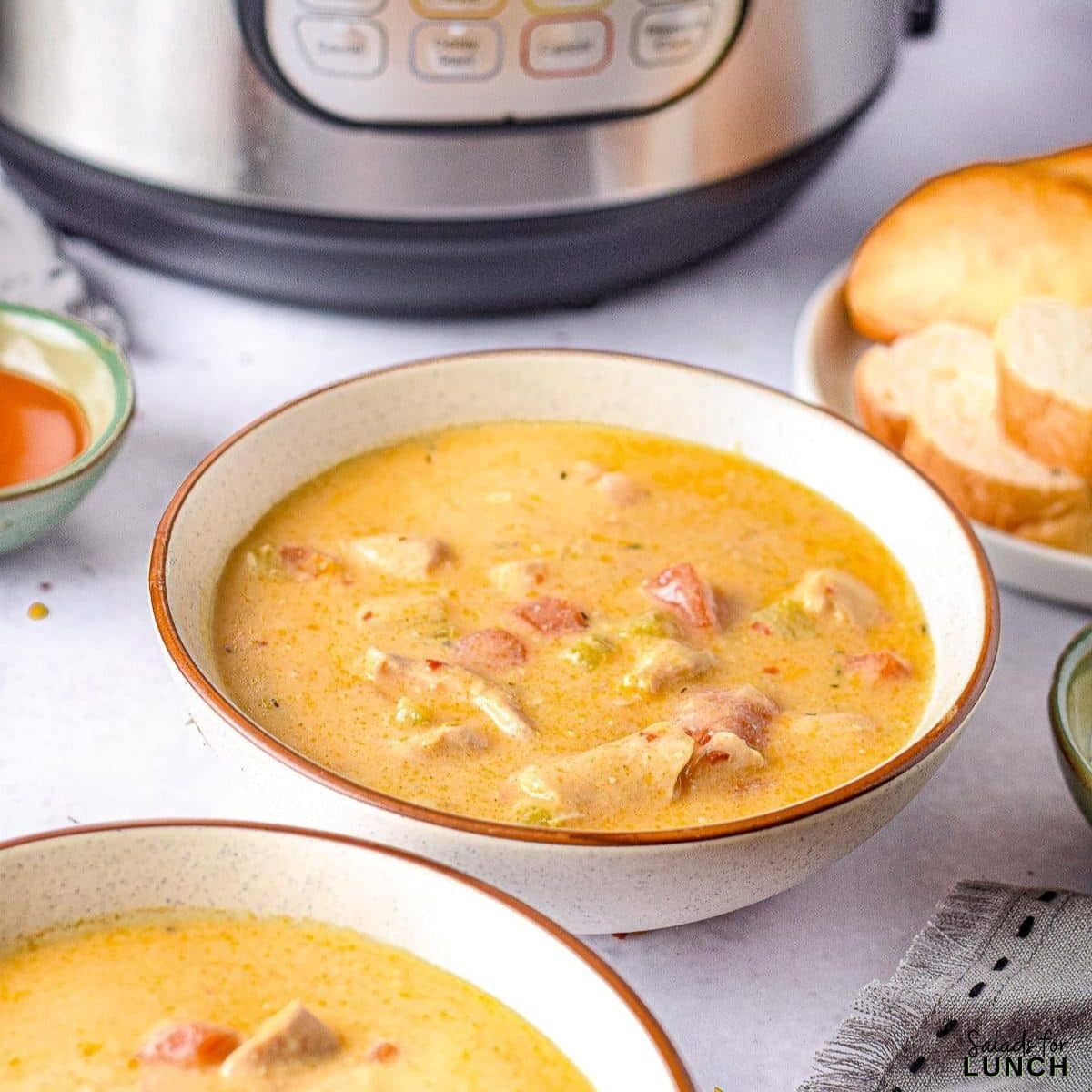 Instant Pot Creamy Buffalo Chicken Soup - Get ready to warm up your taste buds with this Instant Pot Creamy Buffalo Chicken Soup recipe! Packed with tender chunks of chicken, a creamy base with a kick of hot buffalo sauce, and a medley of veggies, it's the perfect comfort food for any season. With just a few simple ingredients, your Instant Pot will do all the work, making this hearty soup a quick and delicious dinner idea.