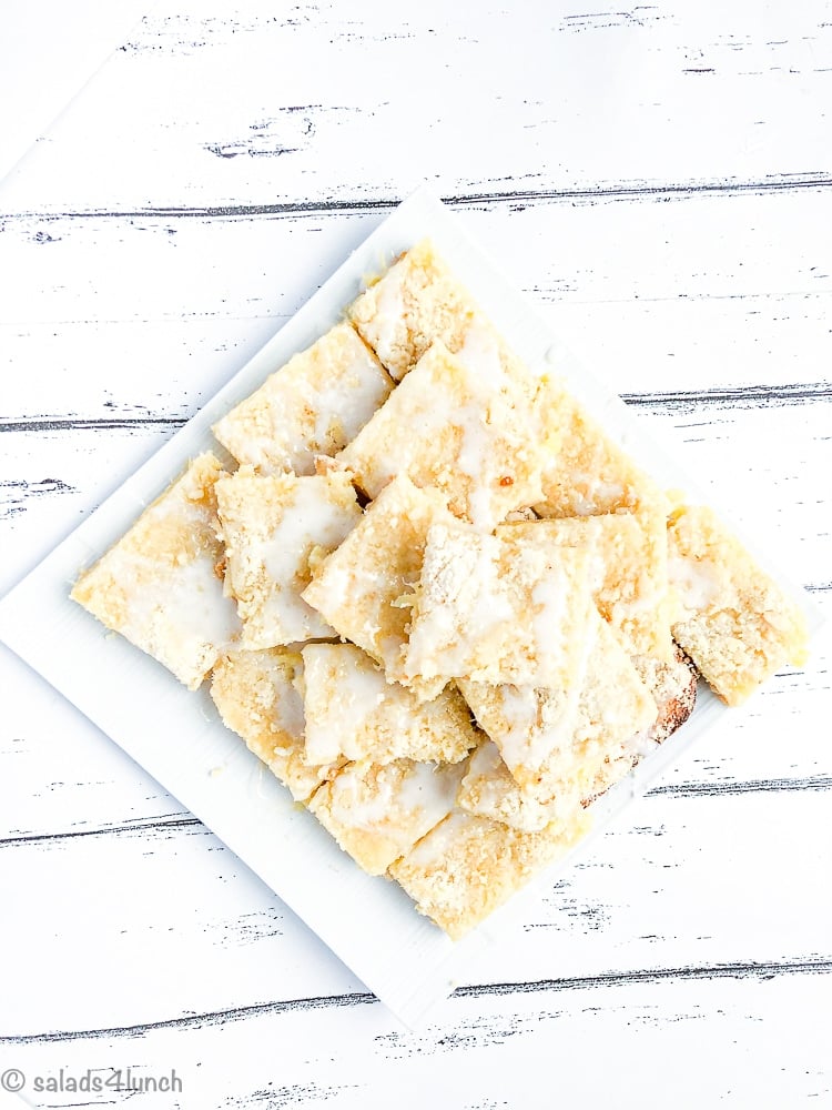 White plate with tower of easy hawiian pineapple squares