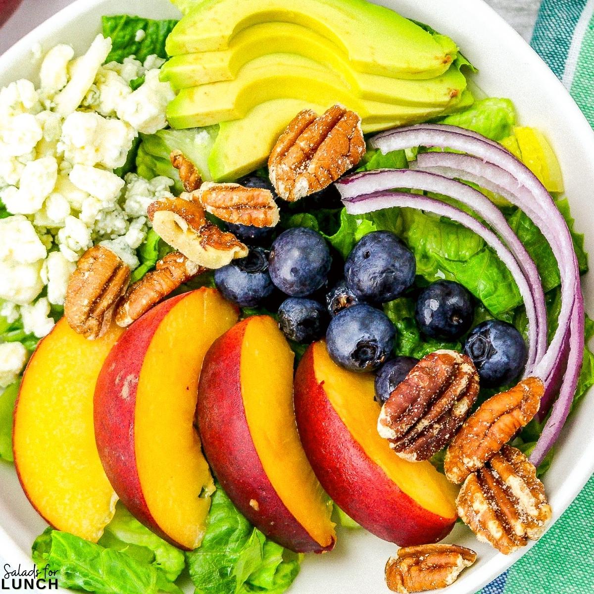 Summer Peach Salad Square Featured Photo 1 - Summer Peach Salad has the perfect balance of sweet, salty, and fresh flavors! Toss in a fresh mint vinaigrette dressing for an easy summer salad your whole family will love!
