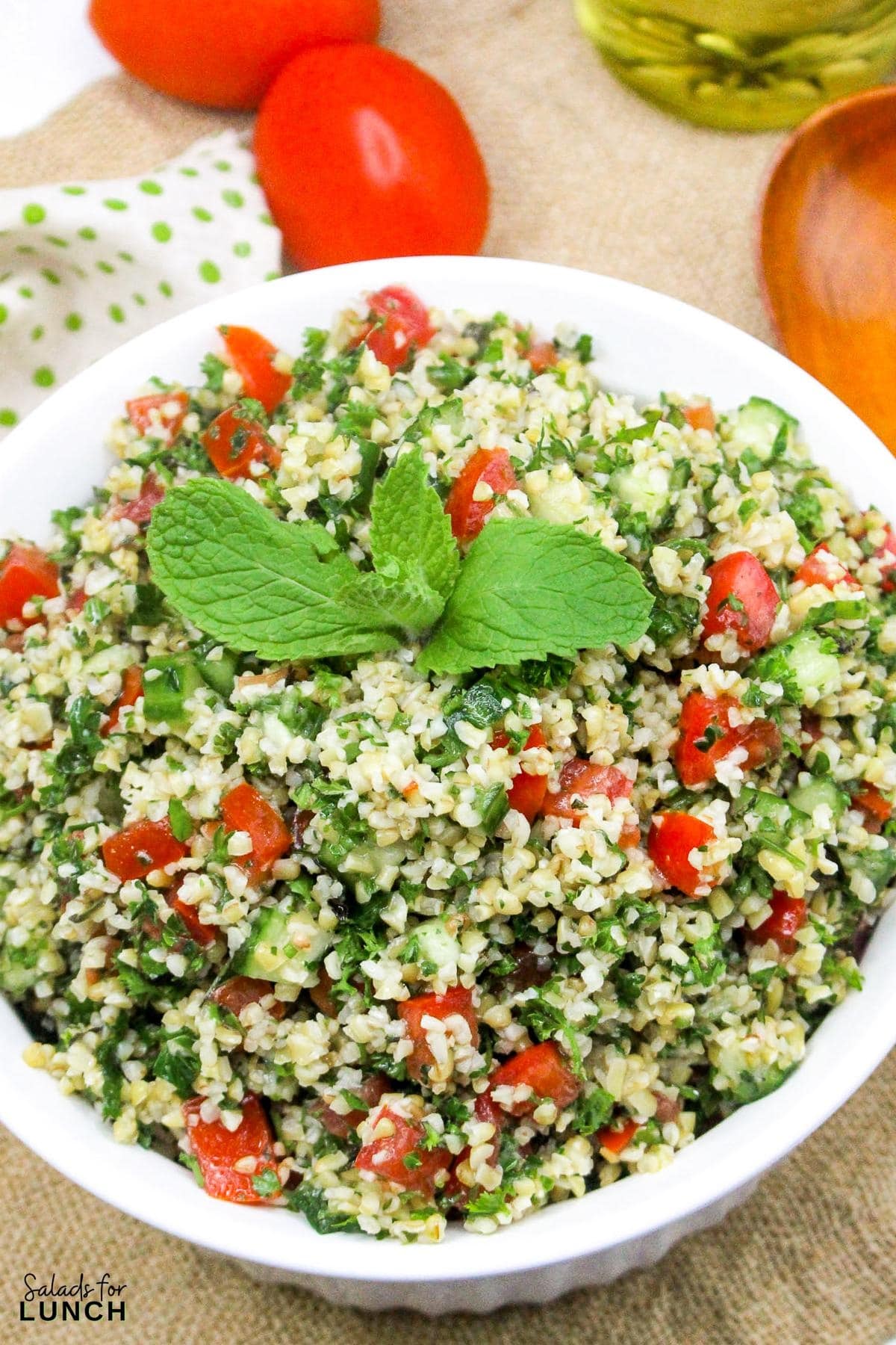 Tabbouleh Salad Recipe 17 - This refreshing Tabbouleh salad is made with bulgur wheat, fresh parsley, mint, tomatoes, and cucumbers, all tossed in a light lemon and olive oil dressing. It's a great option for a light meal or side dish.