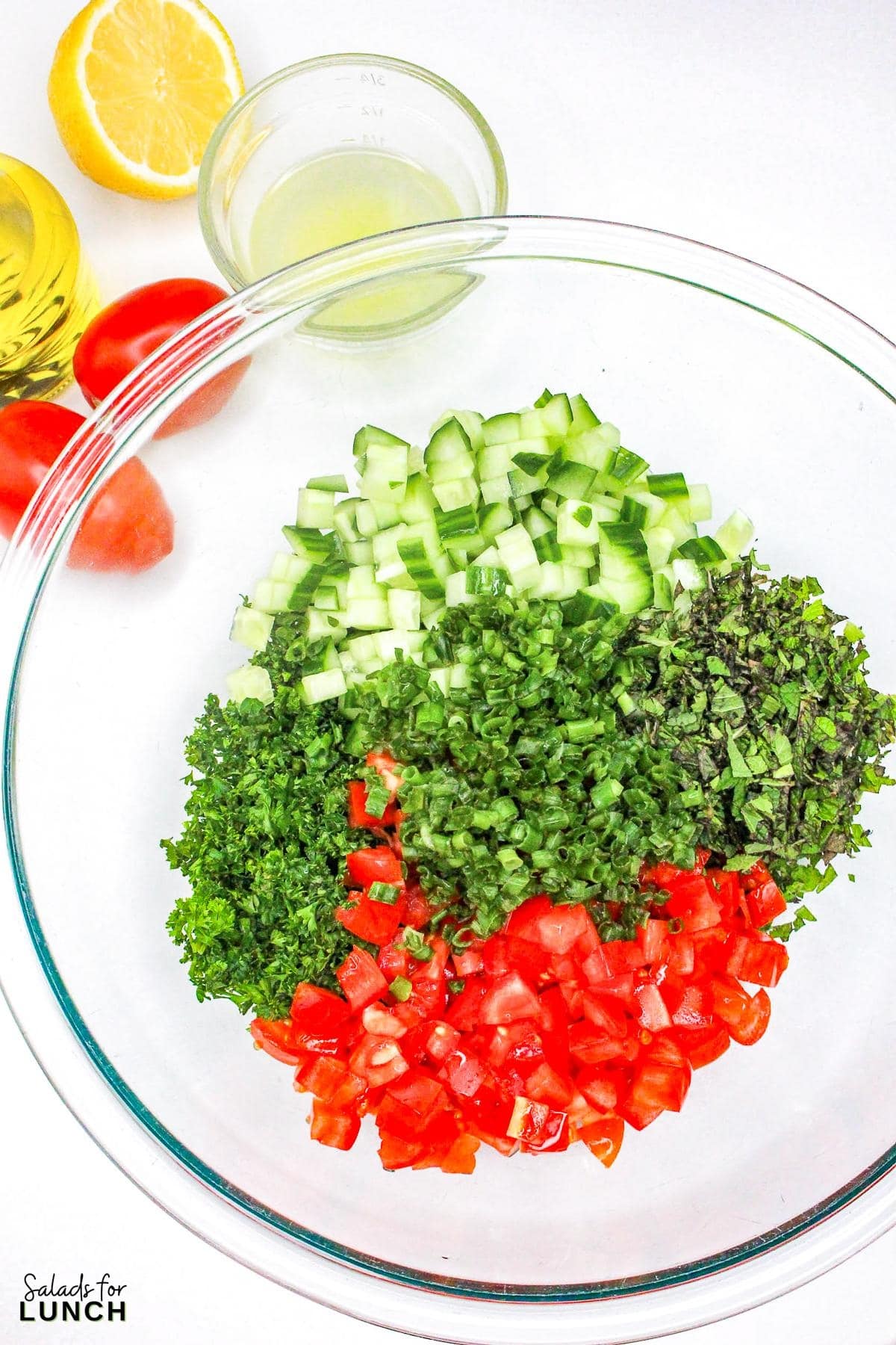 Tabbouleh Salad Recipe 4 - This refreshing Tabbouleh salad is made with bulgur wheat, fresh parsley, mint, tomatoes, and cucumbers, all tossed in a light lemon and olive oil dressing. It's a great option for a light meal or side dish.